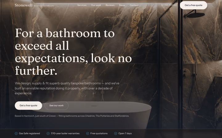 The Stonewell Bathrooms home page: “For a bathroom to exceed all expectations, look no further.” in a serif over a photograph of a dark marble walk-in shower